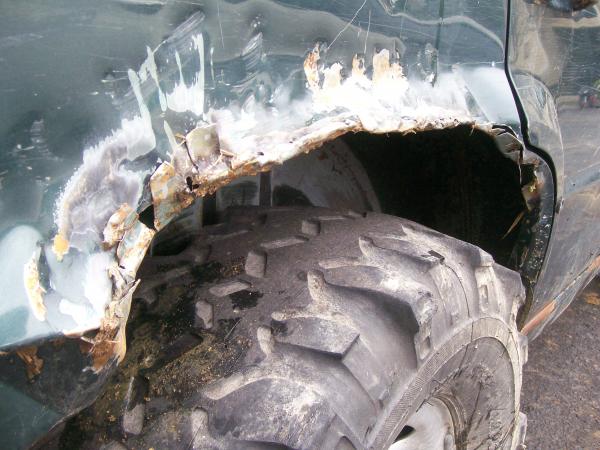 cut the quarters and welded to clear tires, no so pretty.