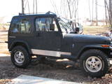 homemade rocker panel guards, roof rack, himount offroad lights on windshiled